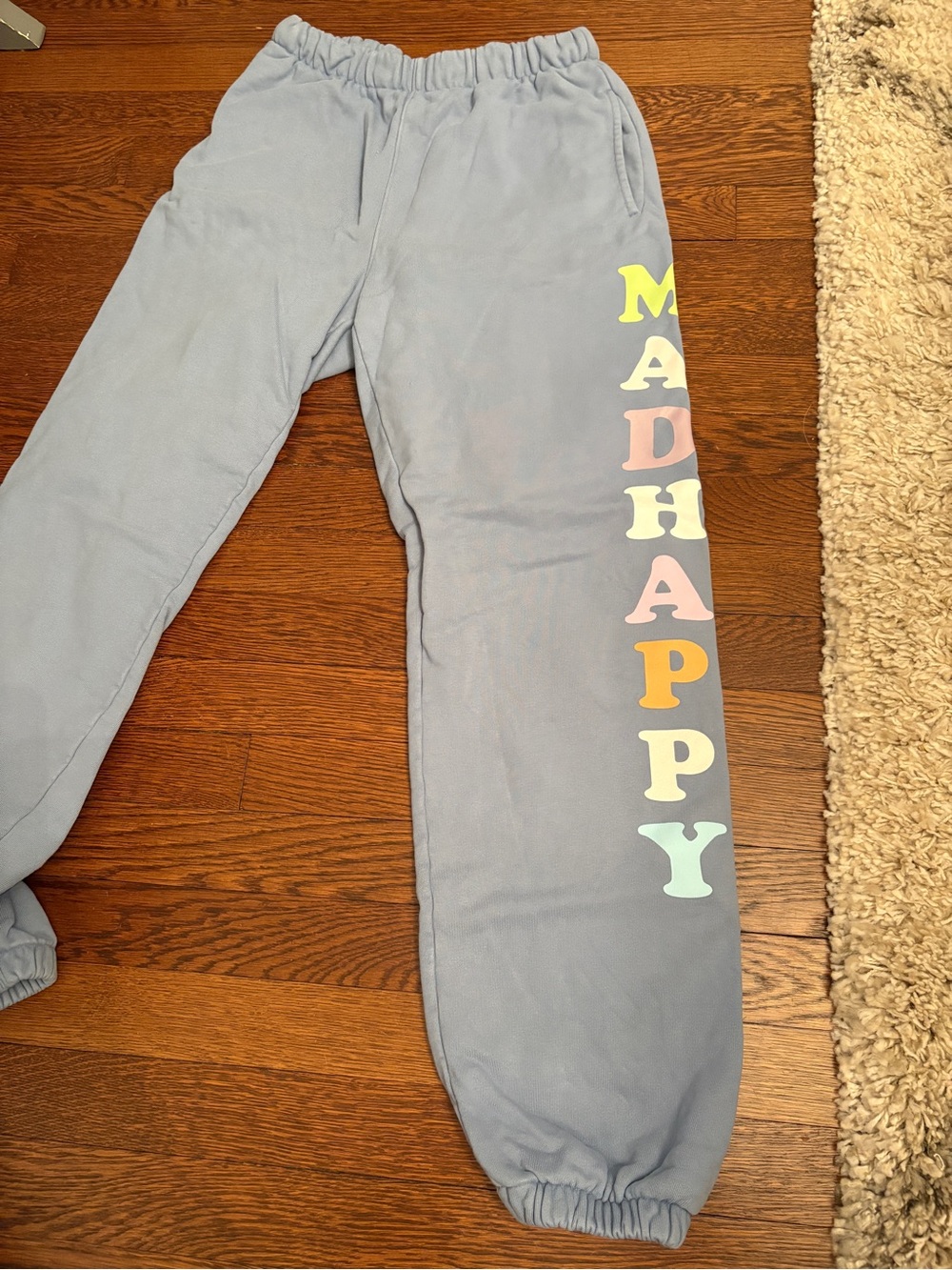 Madhappy Pastel Blue Sweatpants with Vertical Multi-Color Logo